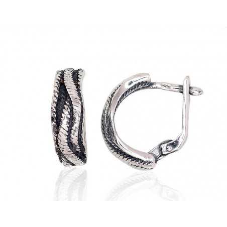 Sidabriniai auskarai ant cilindrinės spynos0