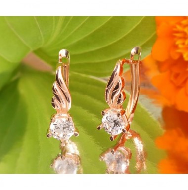 Auksiniai auskarai ant cilindrinės spynos1